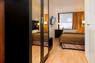 Отель Hotel Korpilampi Эспоо Стандартный двухместный номер с 2 отдельными кроватями — Без возможности установки дополнительной кровати-1